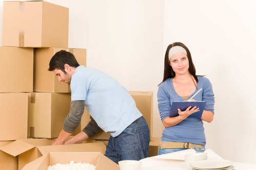 Careful wrapping and organising items during packing and unpacking in Camden